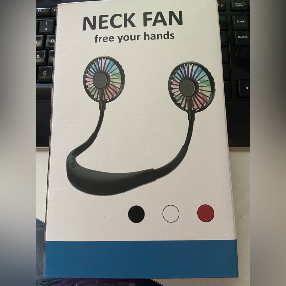 Neck fan with lights. New in the box.